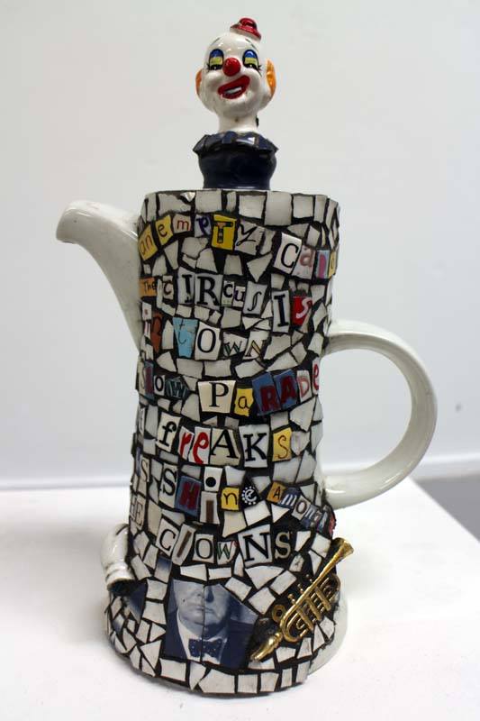 A teapot made out of words and LOVE.